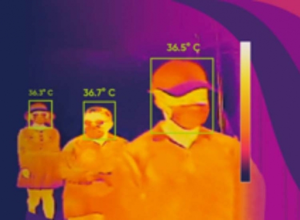 Thermal images of three people